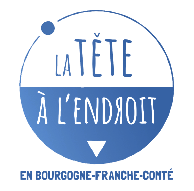 logo la tête à l'endroit