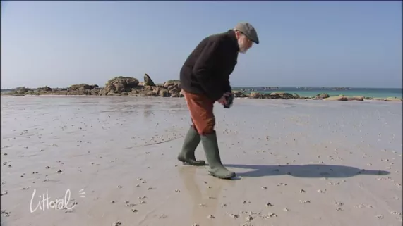 En bottes sur la plage en bottes sur la plage