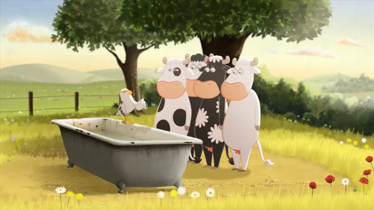 Les vaches près de l'abreuvoir écoutent le goéland Les vaches près de l'abreuvoir