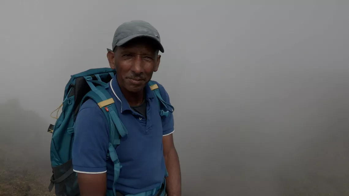 René Dersion au sommet de la montagne Pelée