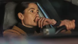 In her car
