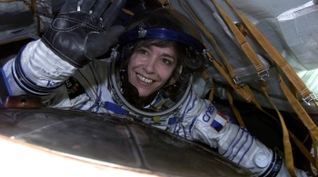 Claudie in Soyuz during Andromède mission in 2001. Credits: ESA/CNES