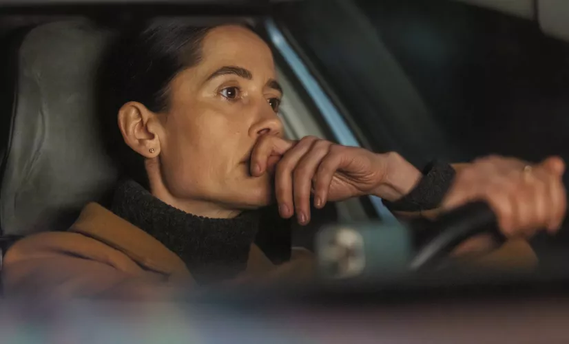 In her car